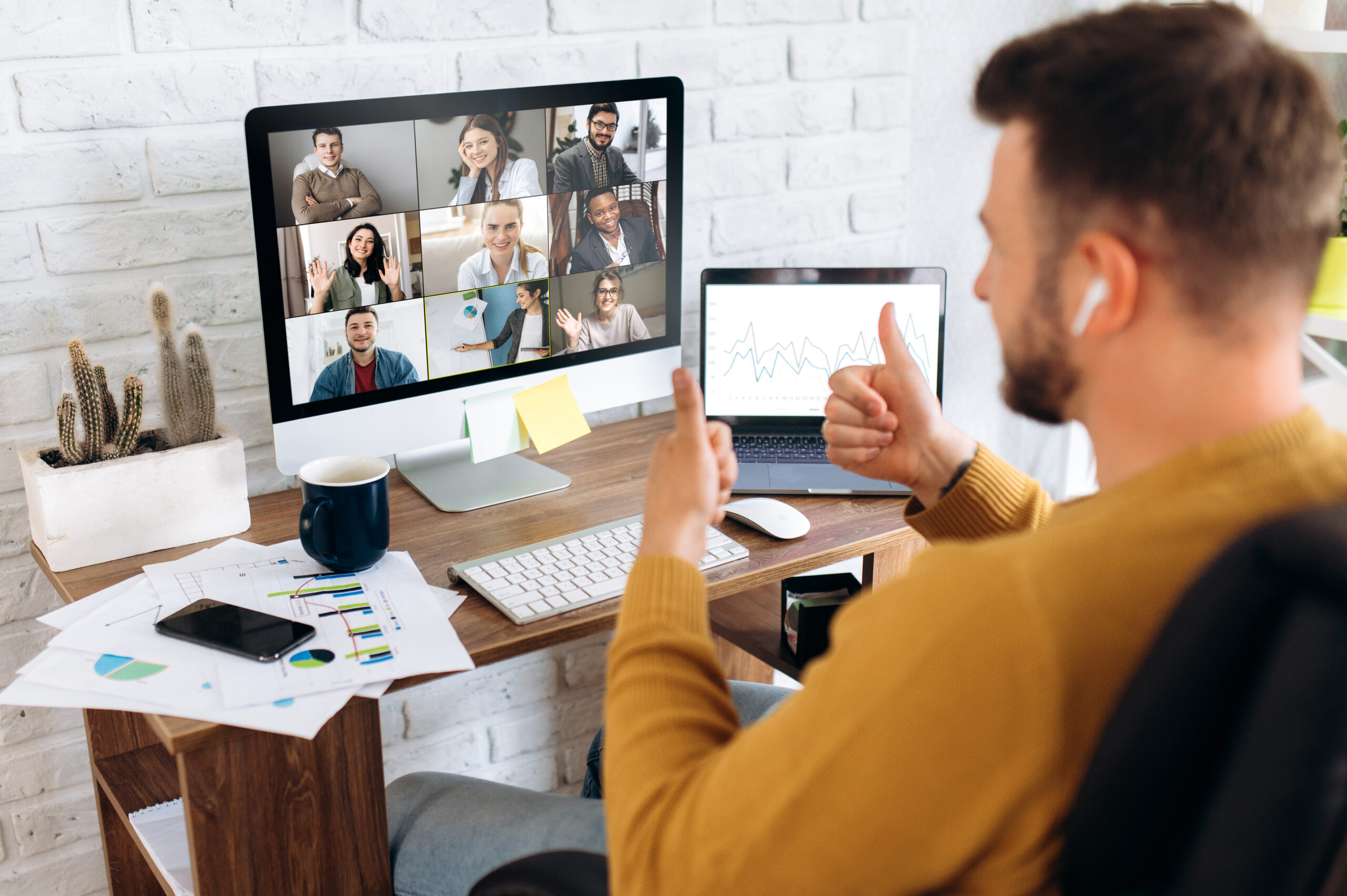 video call conference business people chatting zoom online distant work Video conference. Business partners communicate via video using laptop. The guy talks with his business partners appearance about plans and strategy. Distant work